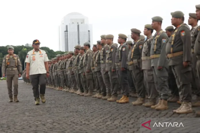 Kepala Satpol PP DKI Jakarta, Satriadi Gunawan saat apel pengamanan perayaan Natal 2024 di Jakarta, Jumat (20/12/2024). ANTARA/HO-Pemerintah Provinsi DKI Jakarta.