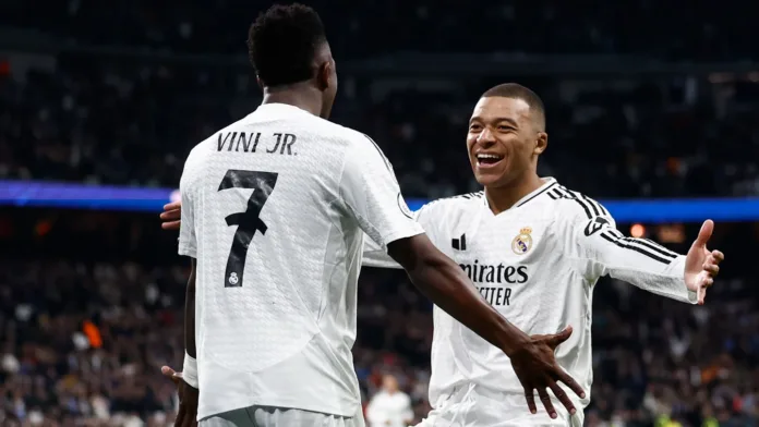 Vini Jr dan Kylan Mbappe. Foto: realmadird.com